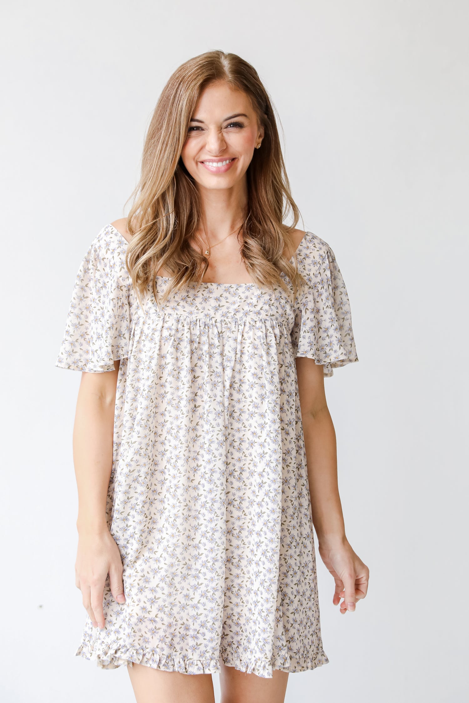 Floral Mini Dress in ivory on model