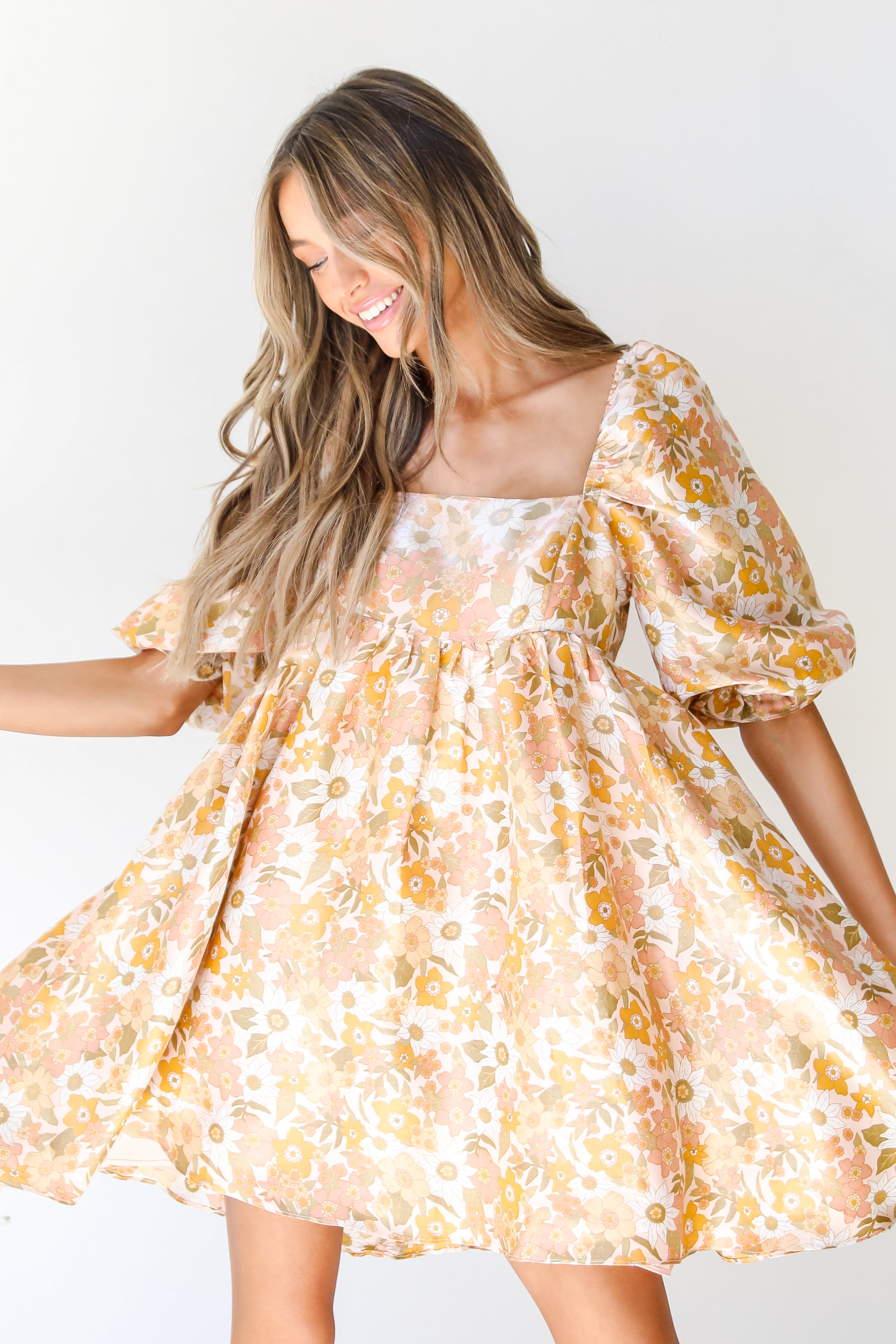 blush Floral Babydoll Mini Dress front view on model