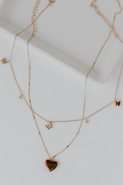 Gold Butterfly + Heart Layered Necklace from dress up