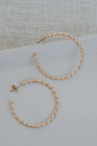 Gold Twisted Hoop Earrings from dress up