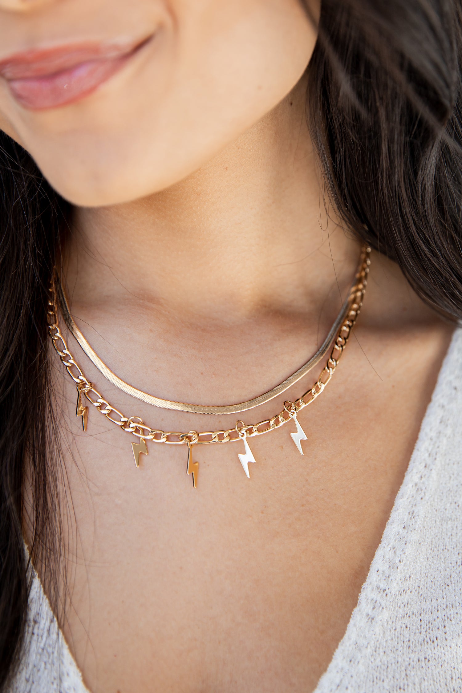 Gold Lightning Bolt Layered Necklace on model