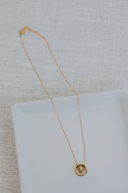 Gold Necklace flat lay