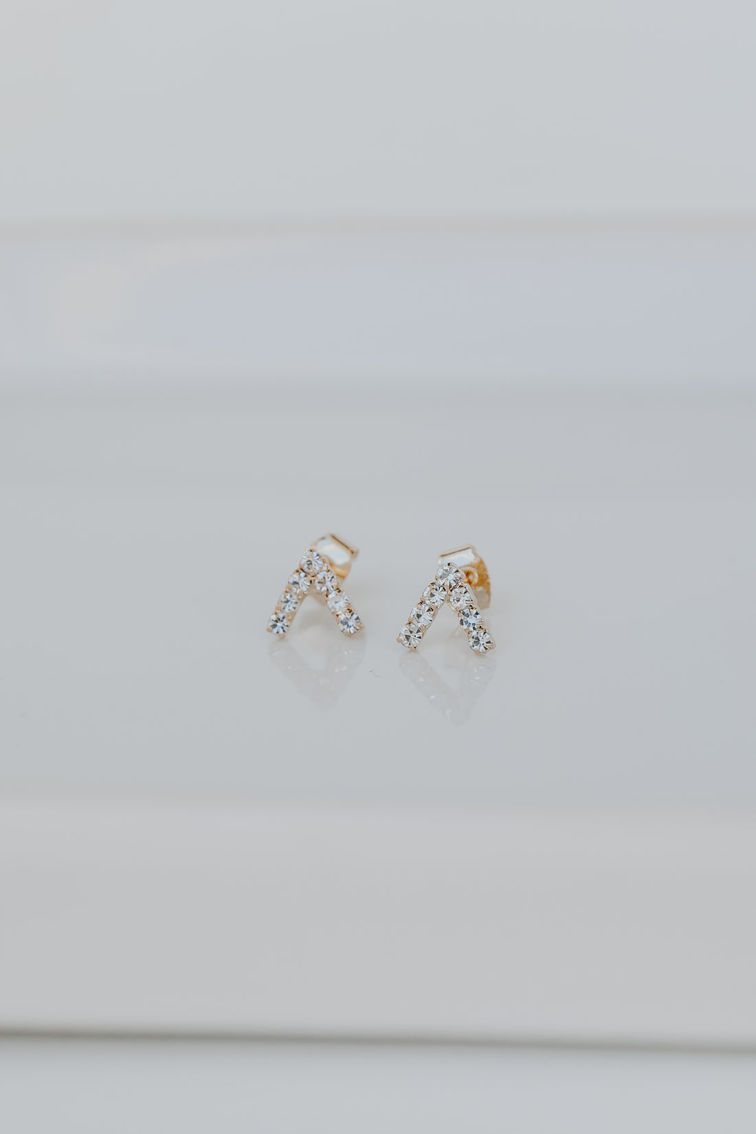 Gold Rhinestone V Stud Earrings from dress up