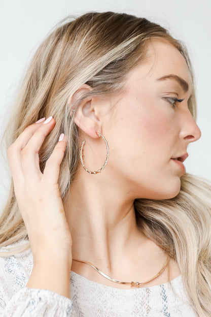 Gold Hoop Earrings on model