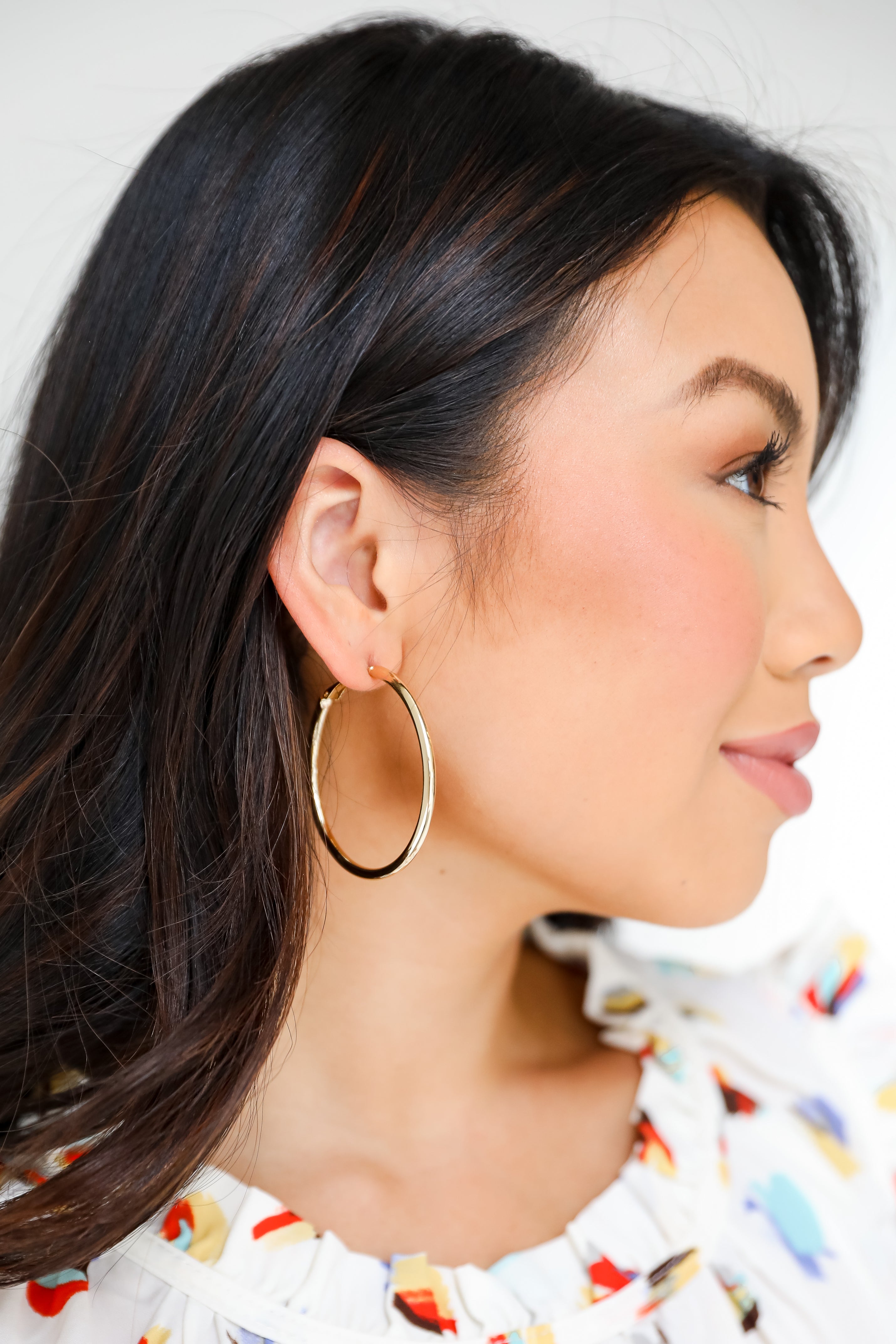 Gold Hoop Earrings on model