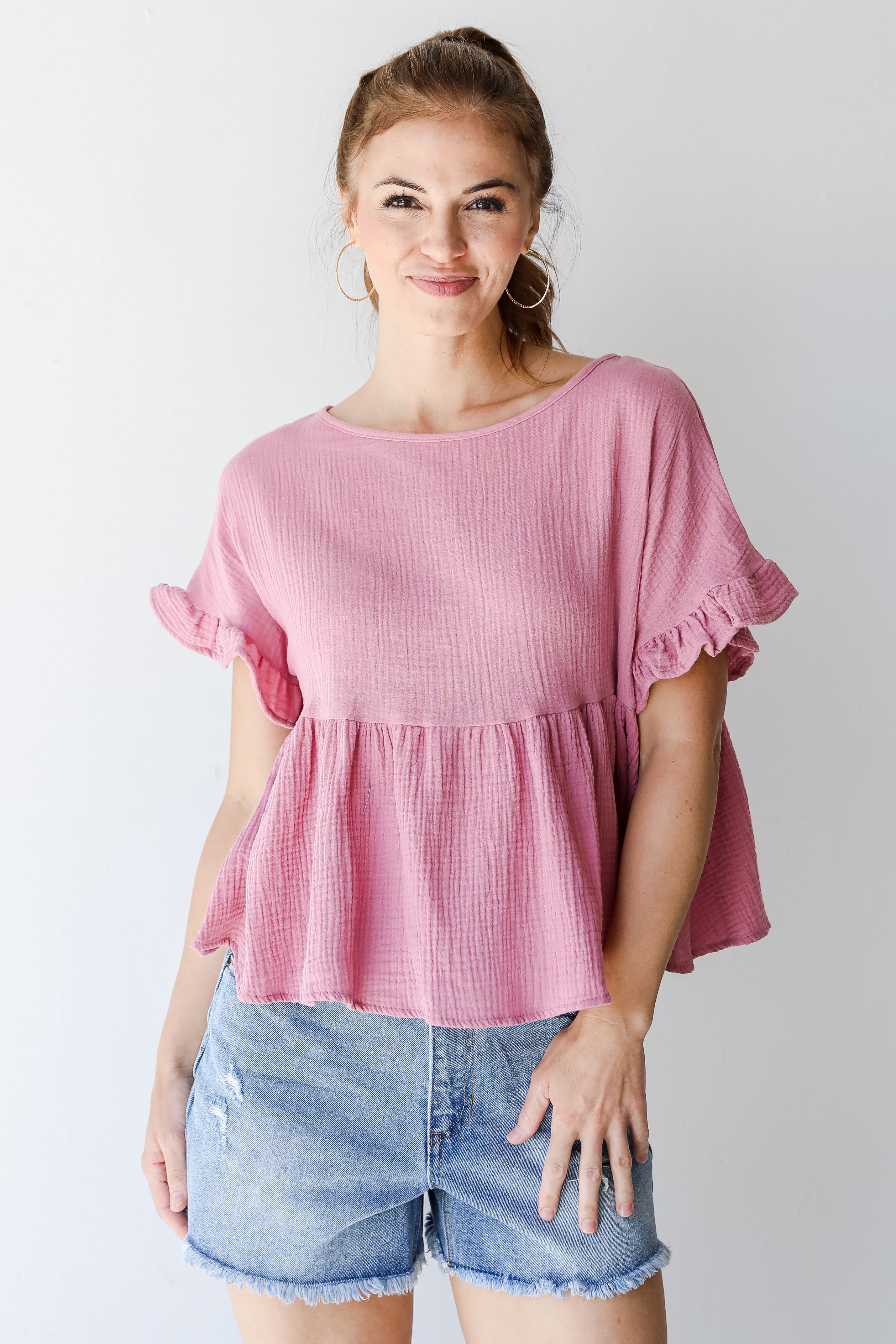 Linen Babydoll Top in mauve on model