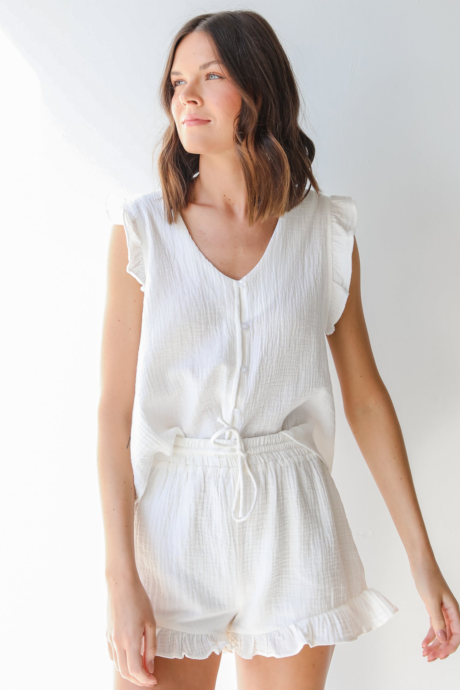 Linen Shorts in white on model