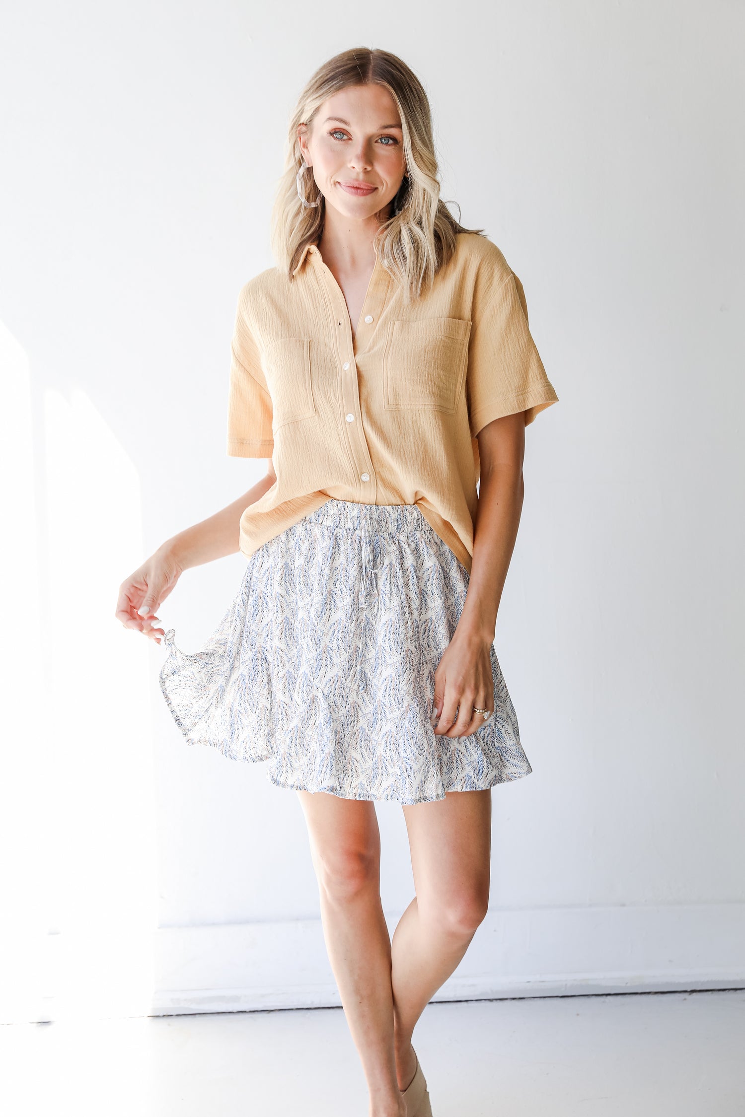 Mini Skirt in ivory on model