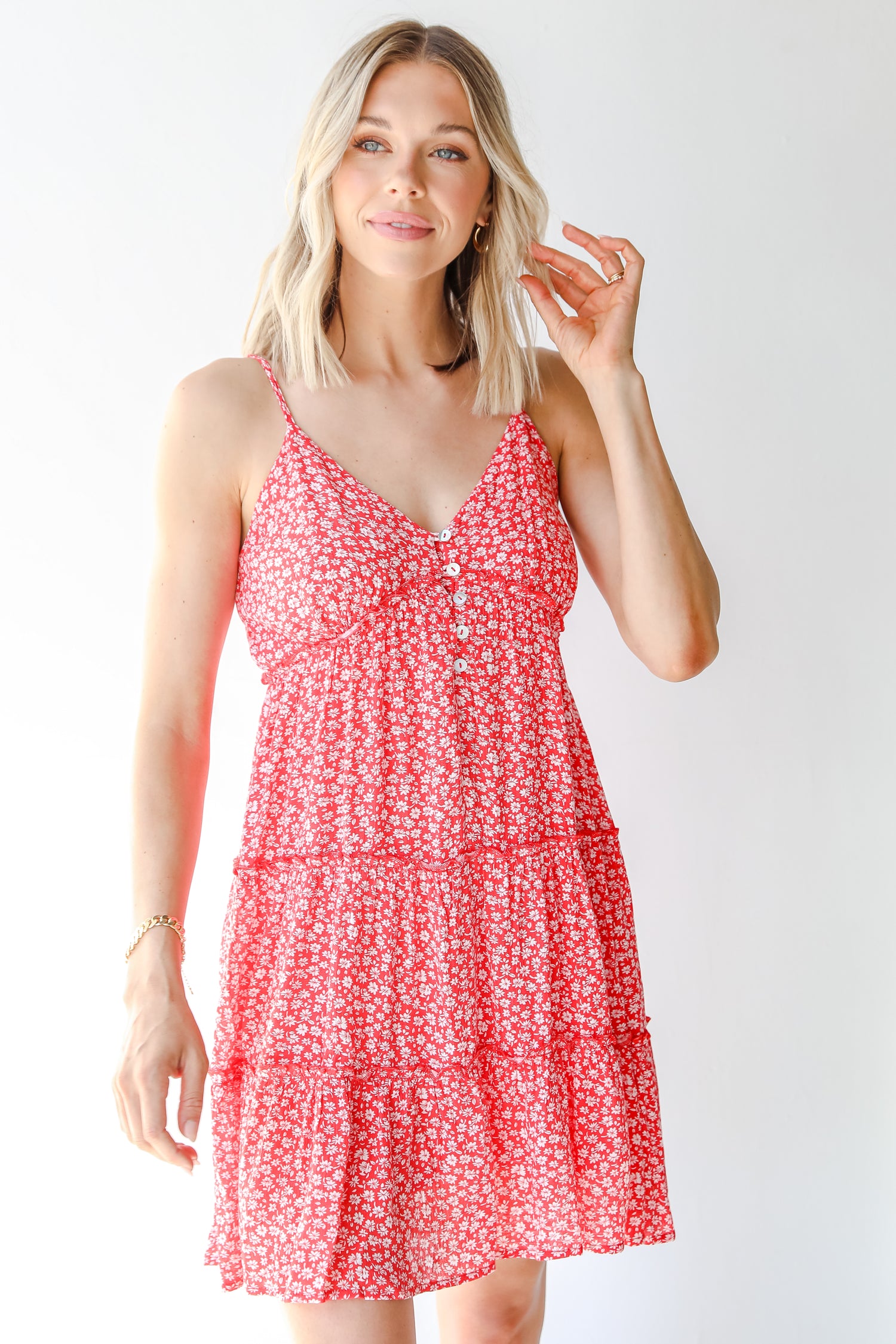 Tiered Floral Mini Dress in red on model