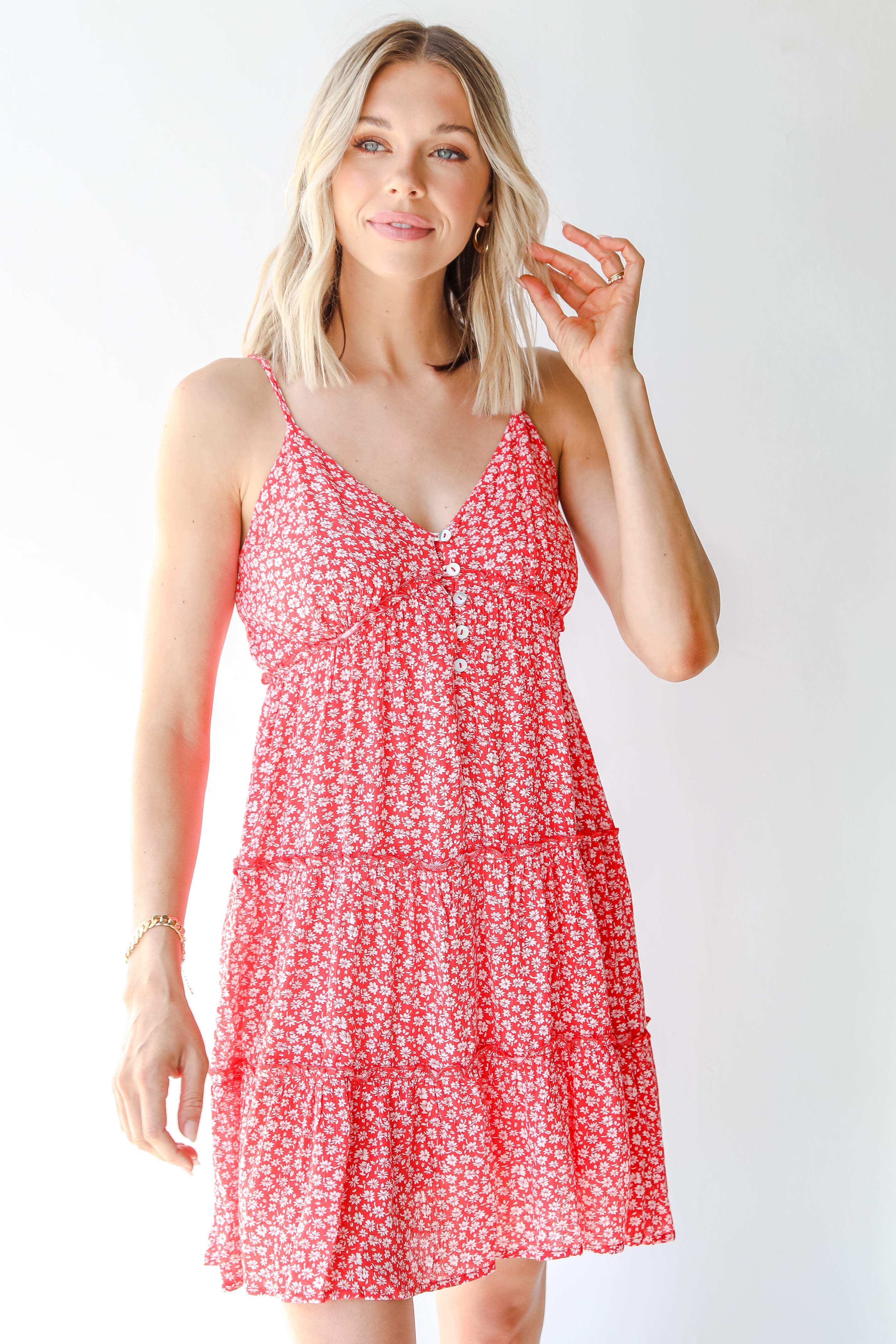 Tiered Floral Mini Dress in red on model