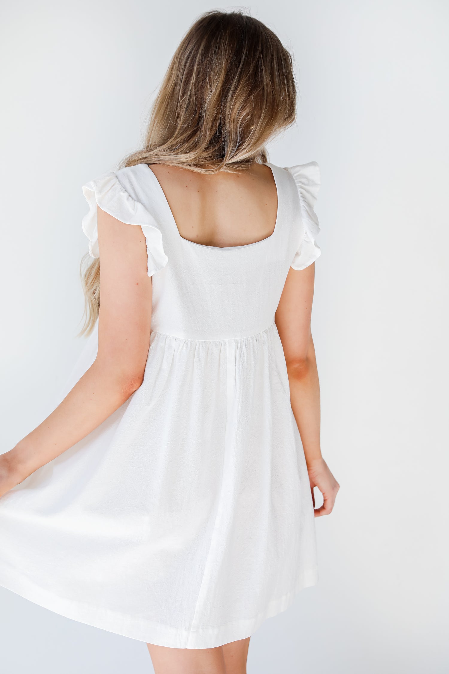 Babydoll Dress in white back view