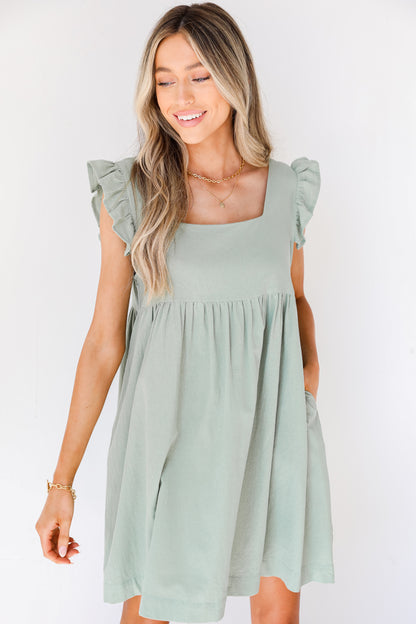 Babydoll Dress in sage on model