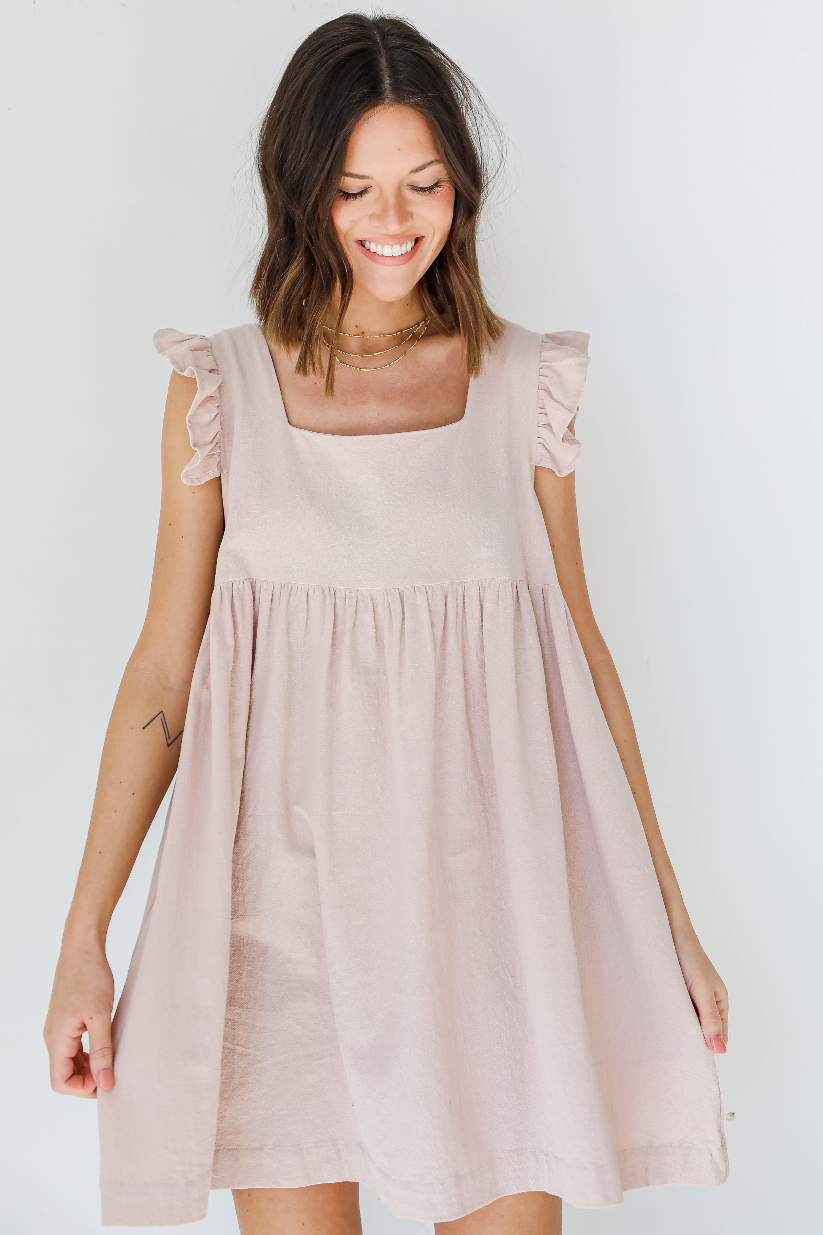 Babydoll Dress in natural on model