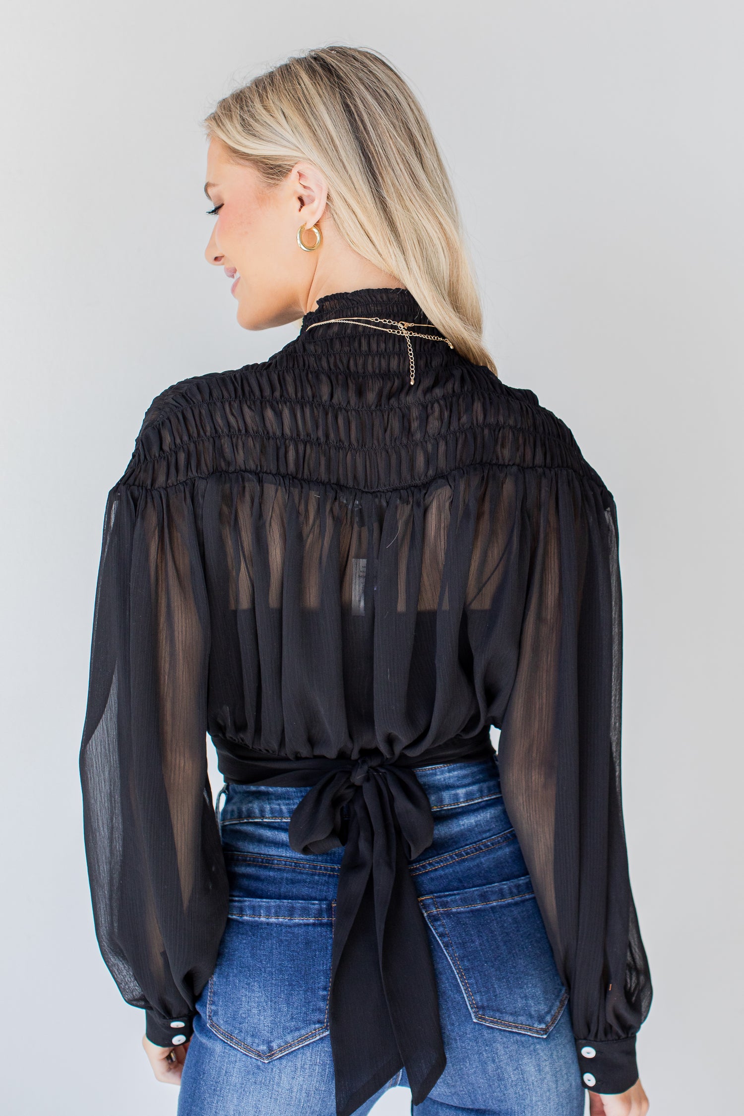 Smocked Blouse in black back view