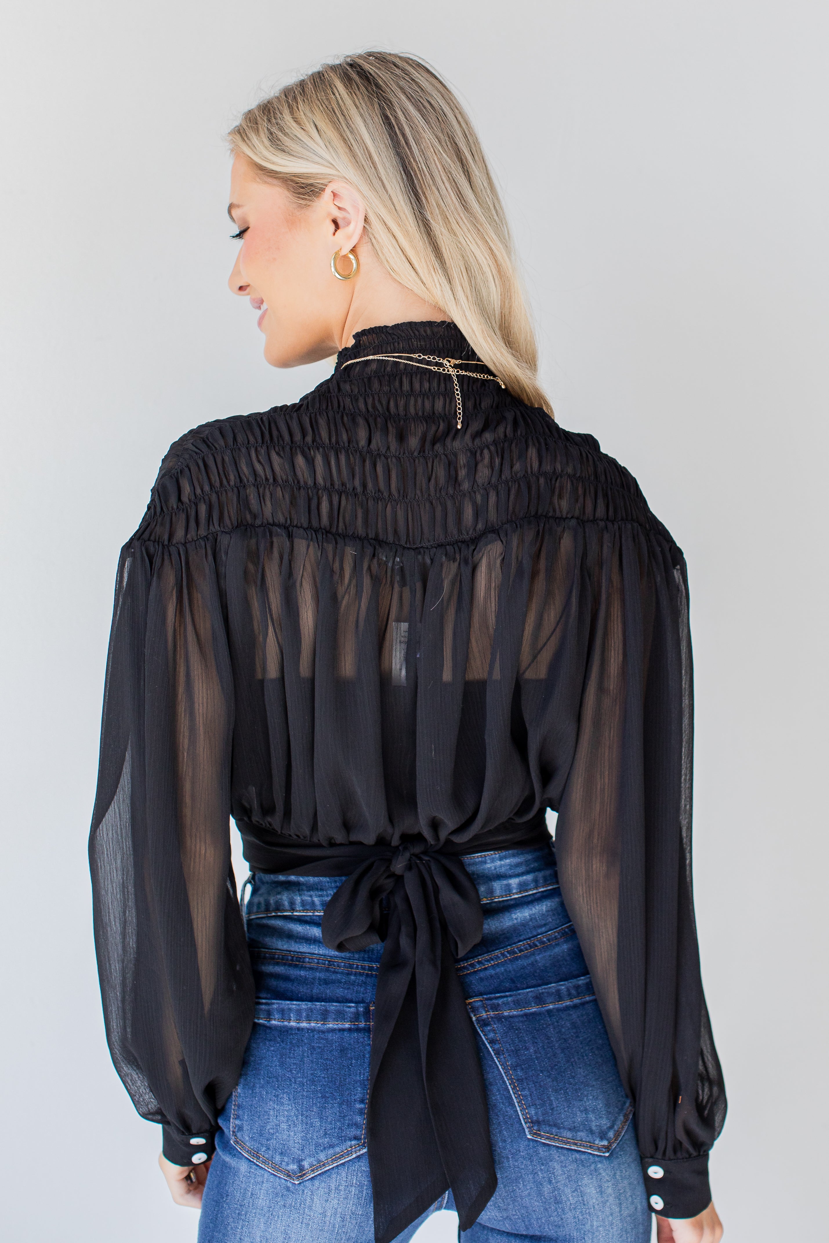 Smocked Blouse in black back view