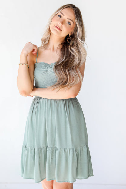 Smocked Mini Dress in sage on model