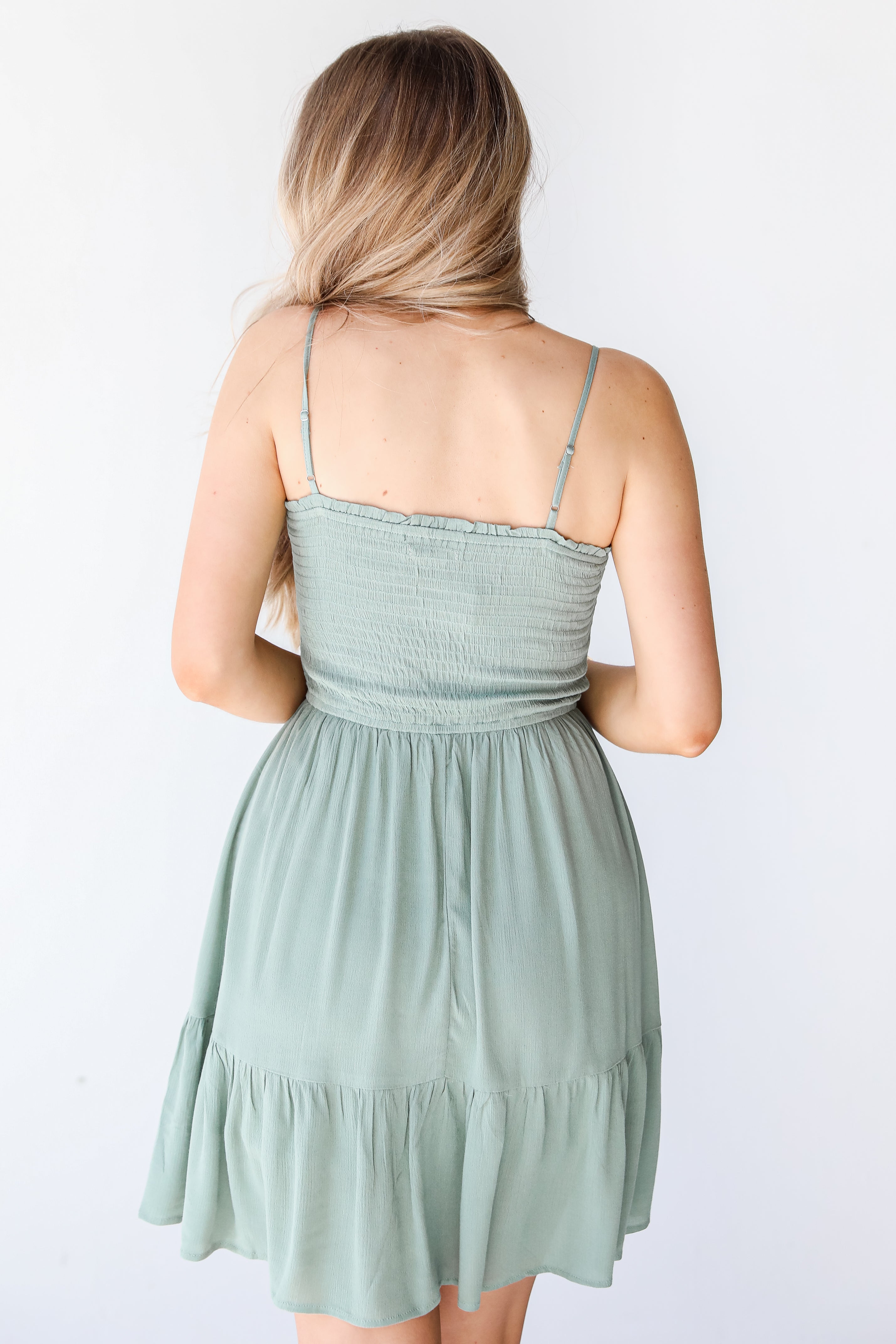 Smocked Mini Dress in sage back view