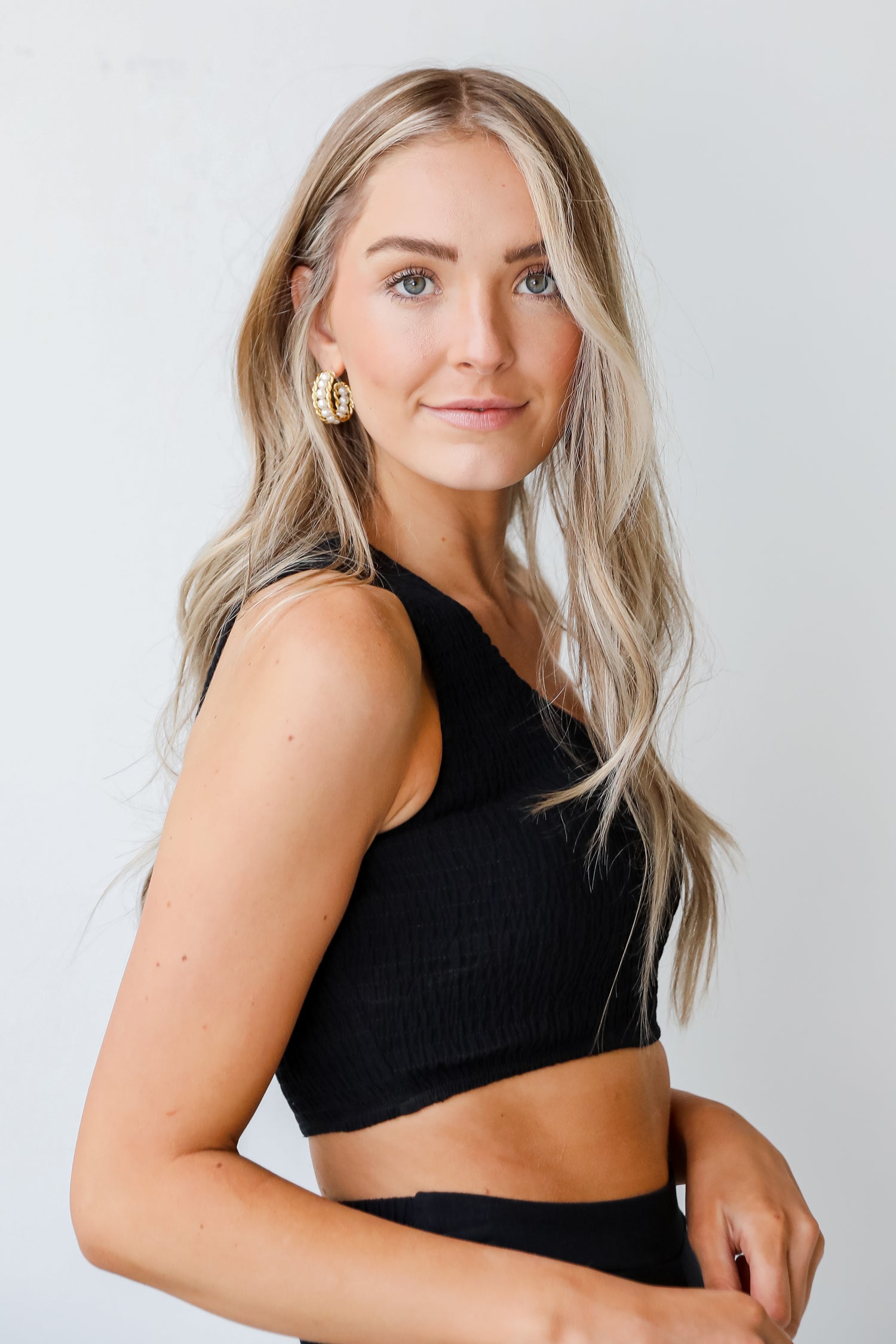 Smocked One-Shoulder Crop Top in black side view